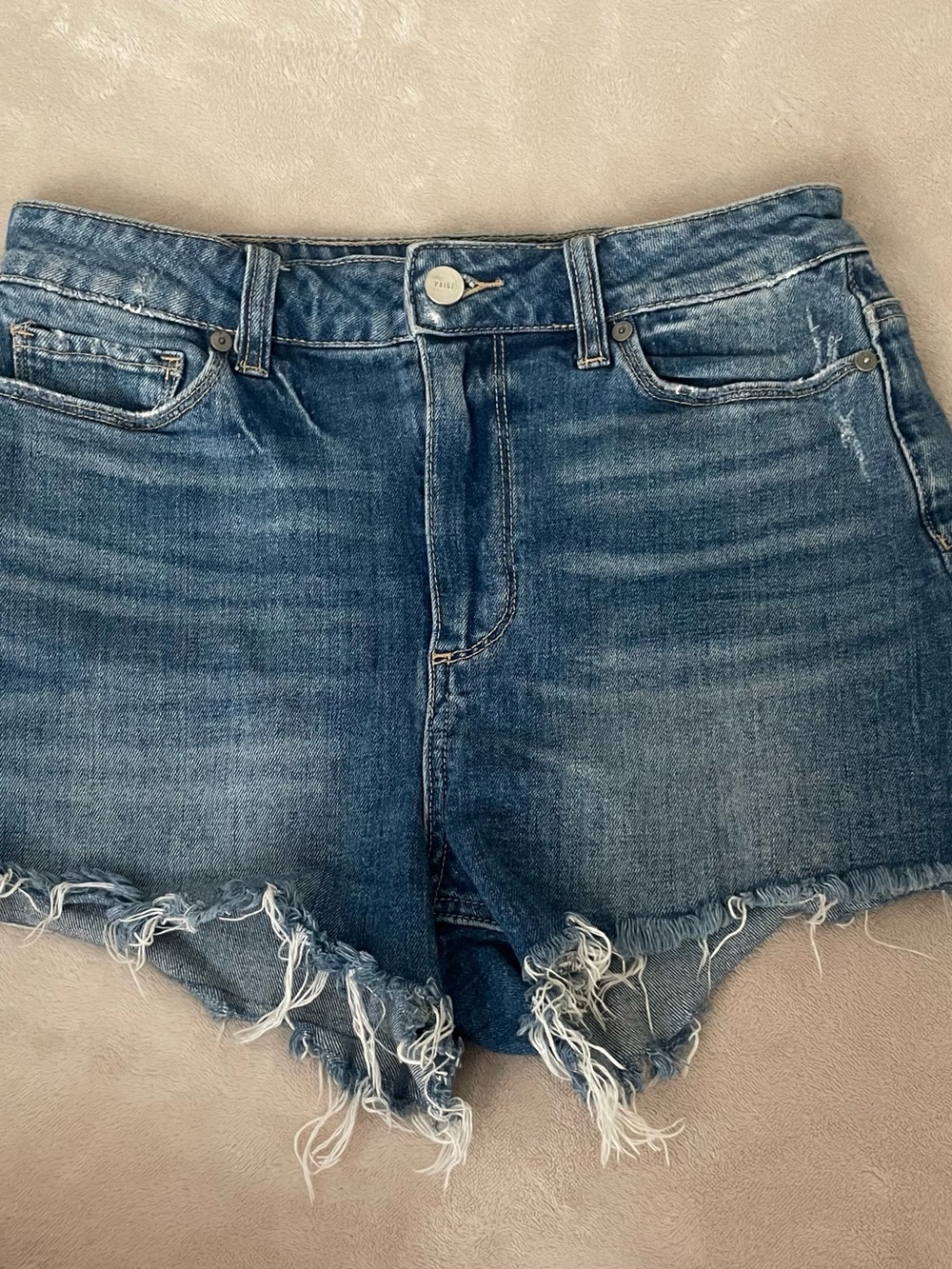 PAIGE Medium Blue Frayed Hem Denim Shorts